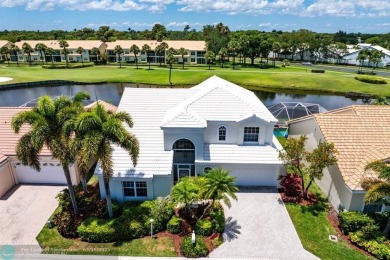 With serene views of the water and golf course, a 2021 roof, and on The Boca Country Club in Florida - for sale on GolfHomes.com, golf home, golf lot