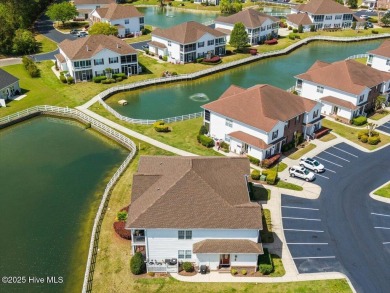 This inviting second-floor condo in the gated community of on Brunswick Plantation and Golf Resorts in North Carolina - for sale on GolfHomes.com, golf home, golf lot