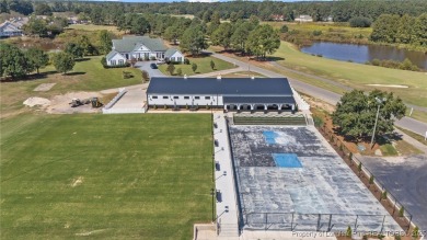 Welcome to this wonderful home in the highly sought-after on Woodlake Country Club in North Carolina - for sale on GolfHomes.com, golf home, golf lot