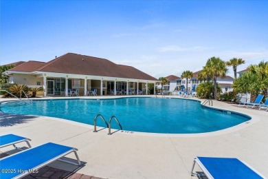 This inviting second-floor condo in the gated community of on Brunswick Plantation and Golf Resorts in North Carolina - for sale on GolfHomes.com, golf home, golf lot