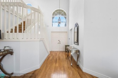 With serene views of the water and golf course, a 2021 roof, and on The Boca Country Club in Florida - for sale on GolfHomes.com, golf home, golf lot