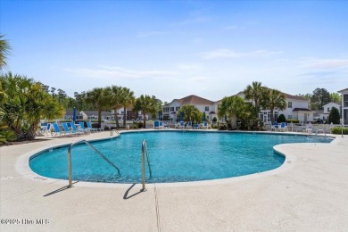 This inviting second-floor condo in the gated community of on Brunswick Plantation and Golf Resorts in North Carolina - for sale on GolfHomes.com, golf home, golf lot