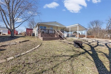 GEM ON THE LAKE - UNBEATABLE VALUE IN LINN VALLEY LAKES! on Linn Valley Lakes - Deer Trace Golf Course in Kansas - for sale on GolfHomes.com, golf home, golf lot