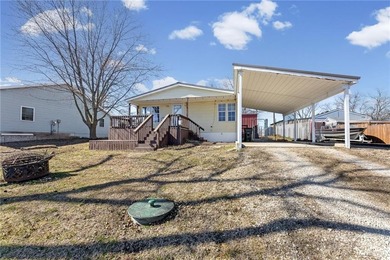 GEM ON THE LAKE - UNBEATABLE VALUE IN LINN VALLEY LAKES! on Linn Valley Lakes - Deer Trace Golf Course in Kansas - for sale on GolfHomes.com, golf home, golf lot