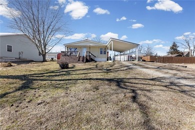 GEM ON THE LAKE - UNBEATABLE VALUE IN LINN VALLEY LAKES! on Linn Valley Lakes - Deer Trace Golf Course in Kansas - for sale on GolfHomes.com, golf home, golf lot