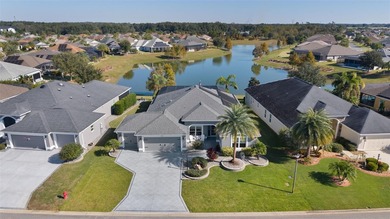 EXPANDED GARDENIA DESIGNER HOME with GOLF CAR GARAGE, LAKEFRONT on Pennbrooke Fairways in Florida - for sale on GolfHomes.com, golf home, golf lot