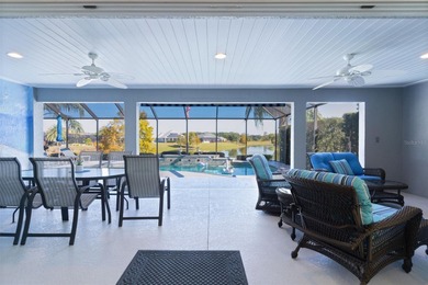 EXPANDED GARDENIA DESIGNER HOME with GOLF CAR GARAGE, LAKEFRONT on Pennbrooke Fairways in Florida - for sale on GolfHomes.com, golf home, golf lot