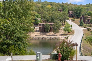 Tucked inside a gated golf community, this newly constructed on Ledgestone Country Club and Golf Course in Missouri - for sale on GolfHomes.com, golf home, golf lot