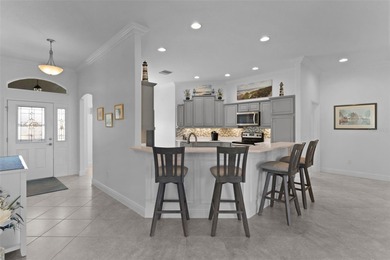 EXPANDED GARDENIA DESIGNER HOME with GOLF CAR GARAGE, LAKEFRONT on Pennbrooke Fairways in Florida - for sale on GolfHomes.com, golf home, golf lot