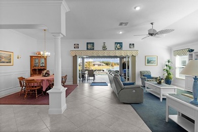 EXPANDED GARDENIA DESIGNER HOME with GOLF CAR GARAGE, LAKEFRONT on Pennbrooke Fairways in Florida - for sale on GolfHomes.com, golf home, golf lot