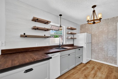 One or more photo(s) has been virtually staged. BEAUTIFULLY on El Diablo Executive Golf Course in Florida - for sale on GolfHomes.com, golf home, golf lot