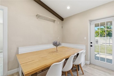 Step into a home where modern luxury meets timeless character on Royal Tee Country Club in Florida - for sale on GolfHomes.com, golf home, golf lot