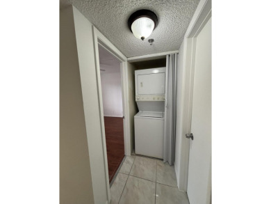Beautiful first floor unit 2 beds/ 2 baths with a lake view in a on Forest Oaks Golf Club in Florida - for sale on GolfHomes.com, golf home, golf lot