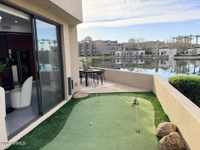 Exceptional waterfront residence in the prestigious gated on Gainey Ranch Golf Club in Arizona - for sale on GolfHomes.com, golf home, golf lot