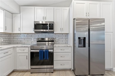 Step into a home where modern luxury meets timeless character on Royal Tee Country Club in Florida - for sale on GolfHomes.com, golf home, golf lot