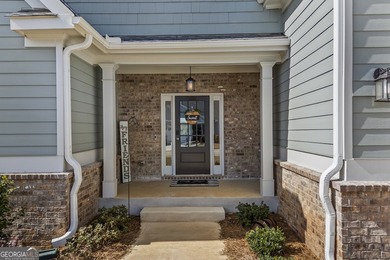 Welcome to ranch-level living in Traditions of Braselton! As you on Traditions of Braselton Golf Club in Georgia - for sale on GolfHomes.com, golf home, golf lot