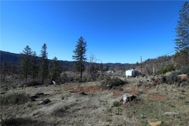 Close to a half acre, this ample lot includes a level building on Adam Springs Golf Course in California - for sale on GolfHomes.com, golf home, golf lot