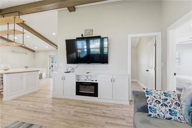 Step into a home where modern luxury meets timeless character on Royal Tee Country Club in Florida - for sale on GolfHomes.com, golf home, golf lot