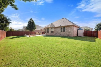 Discover the perfect blend of comfort and style in this move in on Mansfield National Golf Club in Texas - for sale on GolfHomes.com, golf home, golf lot