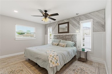 Step into a home where modern luxury meets timeless character on Royal Tee Country Club in Florida - for sale on GolfHomes.com, golf home, golf lot