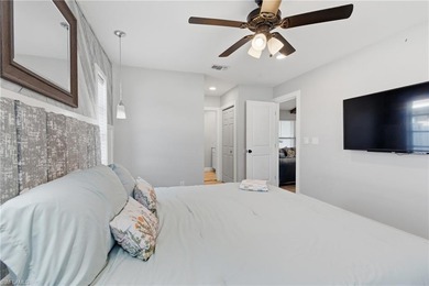 Step into a home where modern luxury meets timeless character on Royal Tee Country Club in Florida - for sale on GolfHomes.com, golf home, golf lot