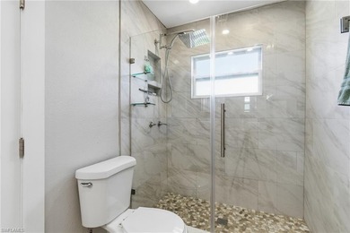 Step into a home where modern luxury meets timeless character on Royal Tee Country Club in Florida - for sale on GolfHomes.com, golf home, golf lot