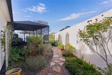 This charming 2/2 ROSEMONT courtyard villa, located in the on The Links of Spruce Creek in Florida - for sale on GolfHomes.com, golf home, golf lot