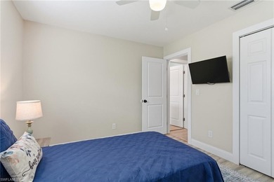 Step into a home where modern luxury meets timeless character on Royal Tee Country Club in Florida - for sale on GolfHomes.com, golf home, golf lot