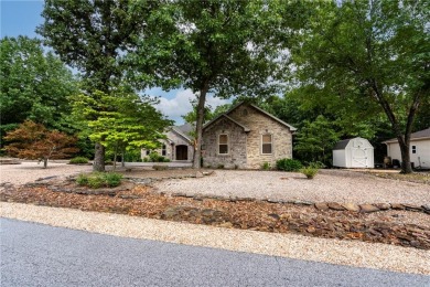 Beautifully landscaped and surrounded by mature trees! This on Bella Vista - Metfield Golf Complex and Country Club in Arkansas - for sale on GolfHomes.com, golf home, golf lot