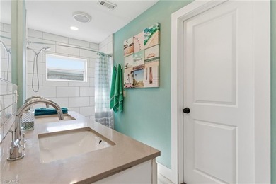 Step into a home where modern luxury meets timeless character on Royal Tee Country Club in Florida - for sale on GolfHomes.com, golf home, golf lot