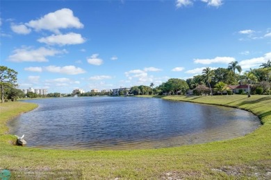 Welcome home to your completely remodeled single family on Palm-Aire Country Club and Resort - Palms in Florida - for sale on GolfHomes.com, golf home, golf lot