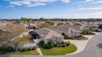 This charming 2/2 ROSEMONT courtyard villa, located in the on The Links of Spruce Creek in Florida - for sale on GolfHomes.com, golf home, golf lot