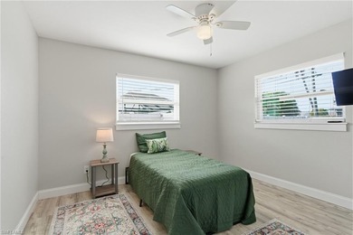 Step into a home where modern luxury meets timeless character on Royal Tee Country Club in Florida - for sale on GolfHomes.com, golf home, golf lot