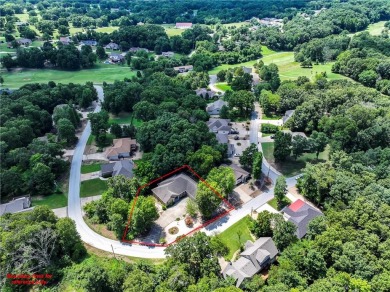 Beautifully landscaped and surrounded by mature trees! This on Bella Vista - Metfield Golf Complex and Country Club in Arkansas - for sale on GolfHomes.com, golf home, golf lot