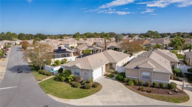 This charming 2/2 ROSEMONT courtyard villa, located in the on The Links of Spruce Creek in Florida - for sale on GolfHomes.com, golf home, golf lot