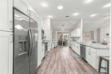 TURNKEY!!  Discover the perfect blend of UNIQUE DESIGN, COMFORT on El Diablo Executive Golf Course in Florida - for sale on GolfHomes.com, golf home, golf lot