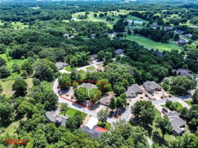 Beautifully landscaped and surrounded by mature trees! This on Bella Vista - Metfield Golf Complex and Country Club in Arkansas - for sale on GolfHomes.com, golf home, golf lot