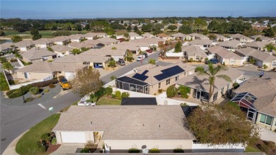 This charming 2/2 ROSEMONT courtyard villa, located in the on The Links of Spruce Creek in Florida - for sale on GolfHomes.com, golf home, golf lot