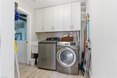 Step into a home where modern luxury meets timeless character on Royal Tee Country Club in Florida - for sale on GolfHomes.com, golf home, golf lot