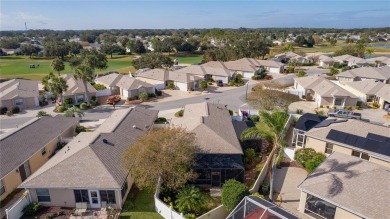 This charming 2/2 ROSEMONT courtyard villa, located in the on The Links of Spruce Creek in Florida - for sale on GolfHomes.com, golf home, golf lot