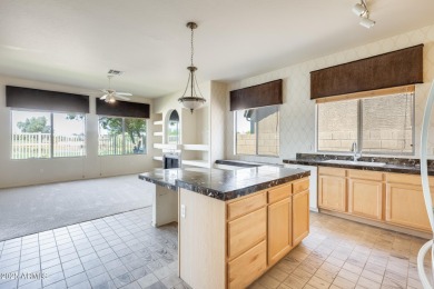 Golf course living at its finest in the highly sought-after on Western Skies Golf Club in Arizona - for sale on GolfHomes.com, golf home, golf lot
