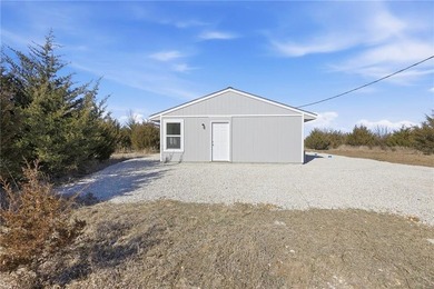 Discover easy, comfortable living in this brand-new 1 bedroom, 1 on Linn Valley Lakes - Deer Trace Golf Course in Kansas - for sale on GolfHomes.com, golf home, golf lot