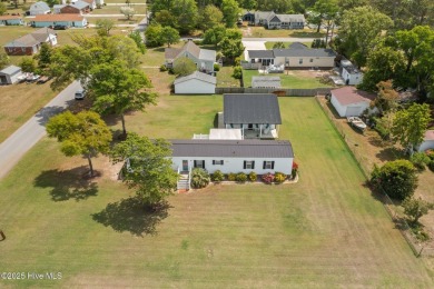 Welcome to this immaculately maintained 3-bedroom, 2-bath home on Star Hill Golf Club  in North Carolina - for sale on GolfHomes.com, golf home, golf lot