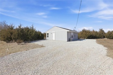 Discover easy, comfortable living in this brand-new 1 bedroom, 1 on Linn Valley Lakes - Deer Trace Golf Course in Kansas - for sale on GolfHomes.com, golf home, golf lot