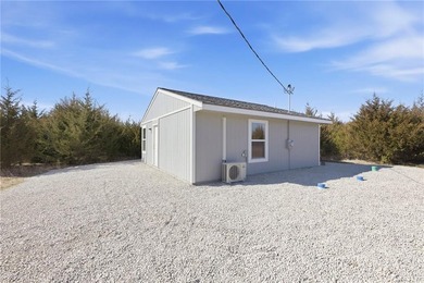 Discover easy, comfortable living in this brand-new 1 bedroom, 1 on Linn Valley Lakes - Deer Trace Golf Course in Kansas - for sale on GolfHomes.com, golf home, golf lot