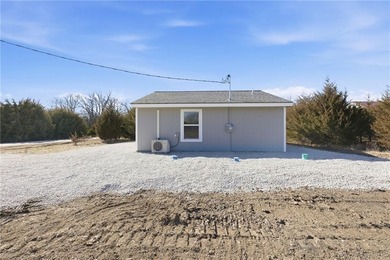 Discover easy, comfortable living in this brand-new 1 bedroom, 1 on Linn Valley Lakes - Deer Trace Golf Course in Kansas - for sale on GolfHomes.com, golf home, golf lot