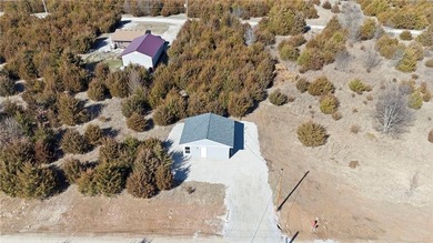 Discover easy, comfortable living in this brand-new 1 bedroom, 1 on Linn Valley Lakes - Deer Trace Golf Course in Kansas - for sale on GolfHomes.com, golf home, golf lot