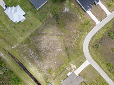 Located in a growing area of Lehigh Acres, this mostly-cleared on Copperhead Golf Club in Florida - for sale on GolfHomes.com, golf home, golf lot
