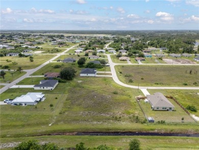 Located in a growing area of Lehigh Acres, this mostly-cleared on Copperhead Golf Club in Florida - for sale on GolfHomes.com, golf home, golf lot
