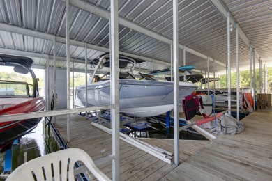 A Stunning Lakefront Retreat on the  Shores of Table Rock on Kimberling City Golf Club in Missouri - for sale on GolfHomes.com, golf home, golf lot